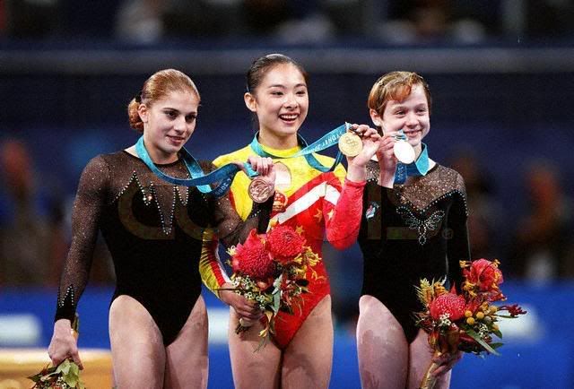 Elena Produnova, Liu Xuan, And Ekaterina Lobaznyuk Holding Their Beam