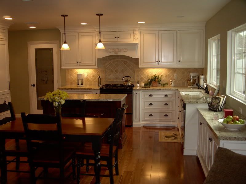 santa cecelia granite and white cabinets pics    Kitchens Forum