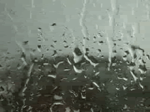 chuva escorrendo pela janela