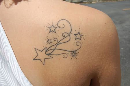 sexy girl wuth design Pink Star Tattoo lower back